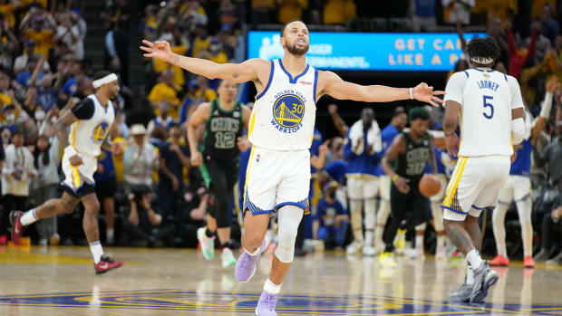 Jun 13, 2022; San Francisco, California, USA; Golden State Warriors guard Stephen Curry (30) celebrates after a three-point basket during the second half in game five of the 2022 NBA Finals against the Boston Celtics at Chase Center.