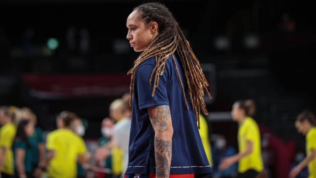 Mercury center Brittney Griner looks on before a game.