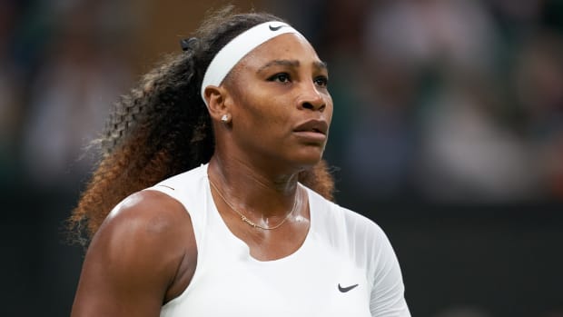 U.S tennis player Serena Williams looks on while playing Aliaksandra Sasnovich of Belarus in the first round of the 2021 Wimbledon tournament.