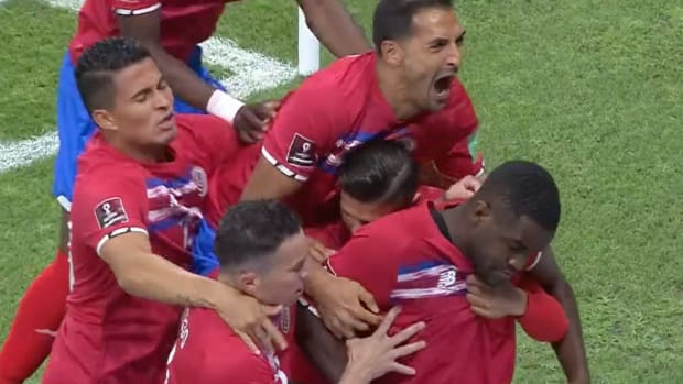Joel Campbell (bottom right) pictured being mobbed by his teammates after scoring for Costa Rica in the CONCACAF-OFC play-off against New Zealand