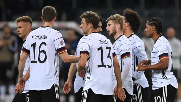 Germany's players pictured congratulating each other during their heavy win over Italy in UEFA Nations League Group A3