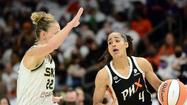Oct 10, 2021; Phoenix, Arizona, USA; Phoenix Mercury guard Skylar Diggins-Smith (4) dribbles against Chicago Sky guard Courtney Vandersloot (22) during the first half of game one of the 2021 WNBA Finals at Footprint Center.