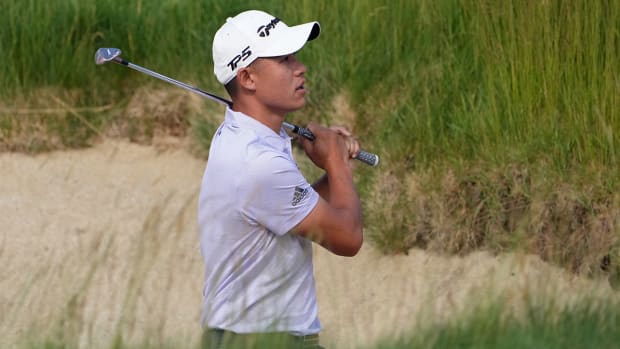 Colin Morikawa plays the bunker at the 2022 U.S. Open.