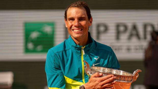 Rafael Nadal (ESP) poses with the trophy after winning the men’s singles final at the 2022 French Open.