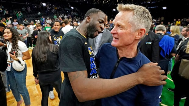 Jun 16, 2022; Boston, Massachusetts, USA; Golden State Warriors forward Draymond Green (23) celebrates with head coach Steve Kerr after the Golden State Warriors beat the Boston Celtics in game six of the 2022 NBA Finals to win the NBA Championship at TD Garden.