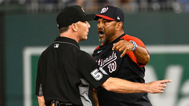 Jun 17, 2022; Washington, District of Columbia, USA; Washington Nationals manager Dave Martinez (4) argues with umpire Dan Iassogna (58) during the tenth inning of the game against the Philadelphia Phillies at Nationals Park.