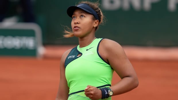 Naomi Osaka (JPN) reacts to a point during her match at French Open 2022.
