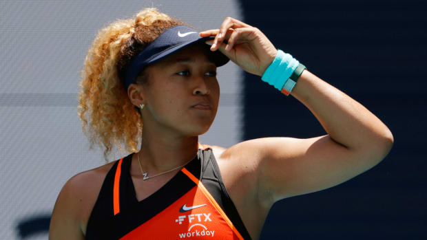Naomi Osaka (JPN) reacts after missing a shot at the 2022 Miami Open.