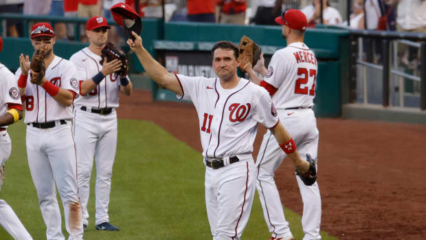 Nationals first baseman Ryan Zimmerman (11) waves to the crowd after being removed from his last career home game.