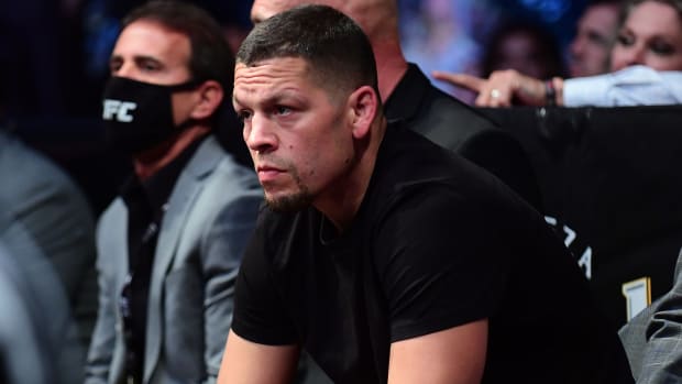Nate Diaz looks on while in attendance during UFC 266.
