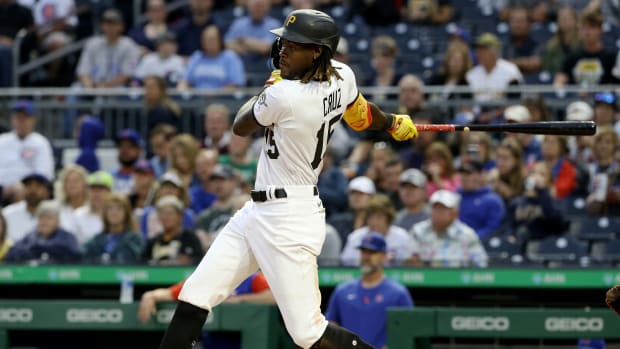 Pittsburgh Pirates shortstop Oneil Cruz (15) hits a three run double against the Chicago Cubs during the third inning inning at PNC Park.