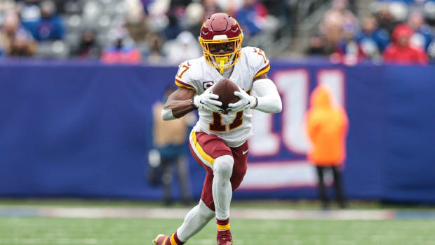 Jan 9, 2022; East Rutherford, New Jersey, USA; Washington Football Team wide receiver Terry McLaurin (17) gains yards after the catch against the New York Giants during the first half at MetLife Stadium.
