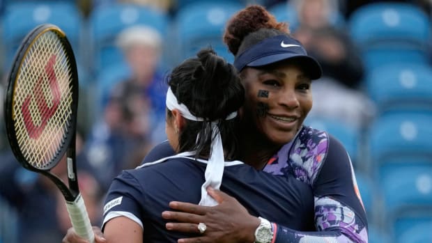 Serena Williams of the United States, right, and Ons Jabeur of Tunisia celebrate after wining their doubles tennis match