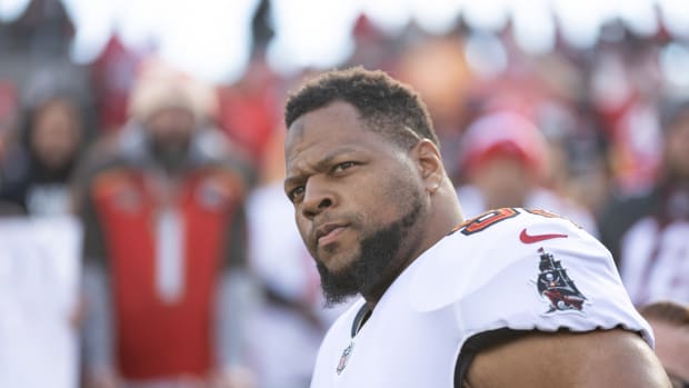 Jan 23, 2022; Tampa, Florida, USA; Tampa Bay Buccaneers defensive end Ndamukong Suh (93) walks onto the field before the game against the Los Angeles Rams during a NFC Divisional playoff football game at Raymond James Stadium. Mandatory Credit: Matt Pendleton-USA TODAY Sports