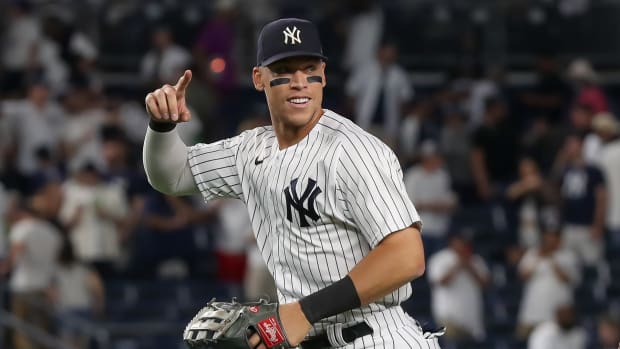New York Yankees CF Aaron Judge points to stands