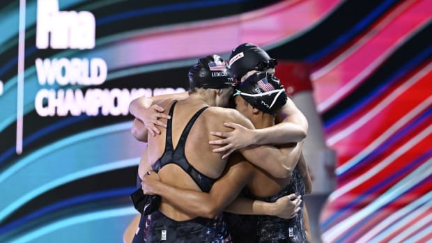 Claire Weinstein, Leah Smith, Katie Ledecky, Bella Sims race the 4x200m freestyle relay for Team USA at the FINA World Championships.
