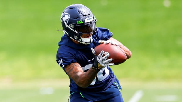 Seattle Seahawks wide receiver Cade Johnson (88) catches a pass during minicamp practice at the Virginia Mason Athletic Center Field.
