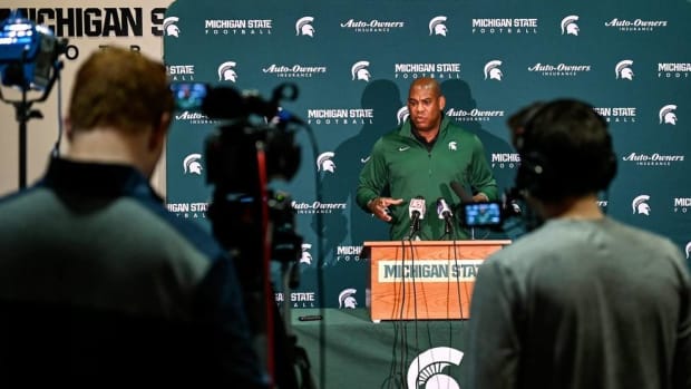 Mel Tucker addresses reporters at a Michigan State press conference.