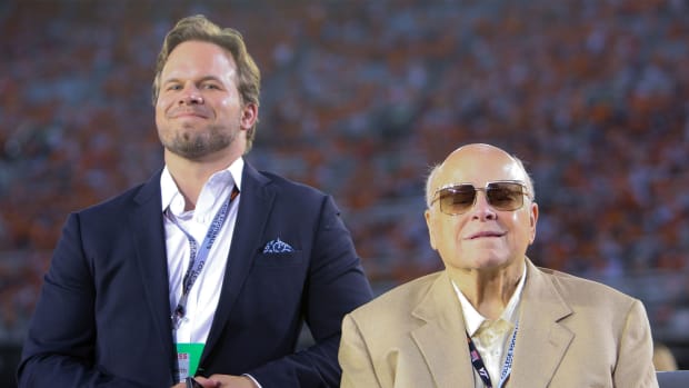 Sep 10, 2016; Bristol, TN, USA; Speedway Motorsports Inc. president and coo Marcus Smith and Speedway Motorsports, Inc. owner and ceo Bruton Smith before the game at Bristol Motor Speedway.