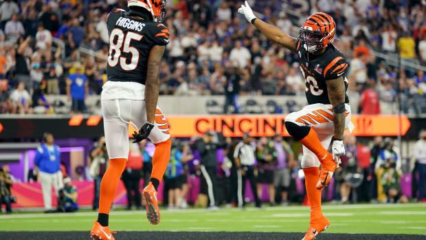 Cincinnati Bengals wide receiver Tee Higgins (85) celebrates a touchdown catch with Cincinnati Bengals running back Joe Mixon (28) in the third quarter during Super Bowl 56 against the Los Angeles Rams, Sunday, Feb. 13, 2022, at SoFi Stadium in Inglewood, Calif. The Cincinnati Bengals lost, 23-20. Nfl Super Bowl 56 Los Angeles Rams Vs Cincinnati Bengals Feb 13 2022 3183