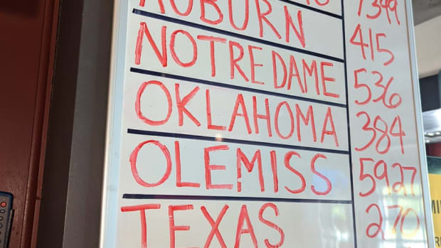 A white board at Rocco's in Omaha, Nebraska displays the current results from its annual Jello Shot Challenge during the College World Series.