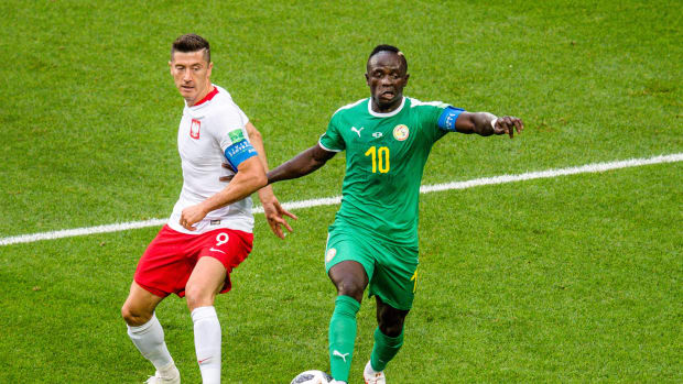 Poland captain Robert Lewandowski (left) and Senegal skipper Sadio Mane pictured in action at the 2018 World Cup