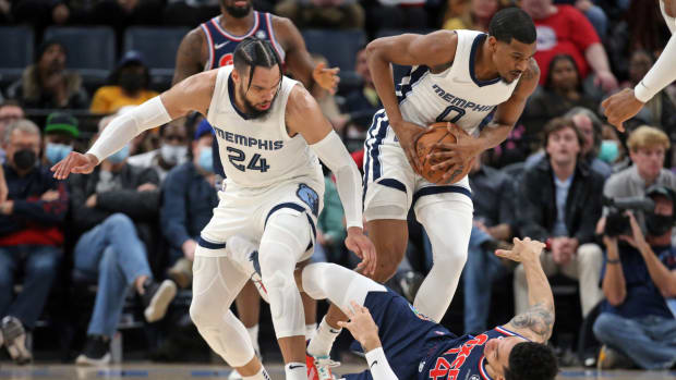 Grizzlies guard De’Anthony Melton steals the ball from the 76ers’ Danny Green.