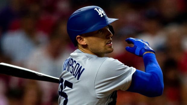 Los Angeles Dodgers designated hitter Trayce Thompson (25) hits a 2-run RBI double.