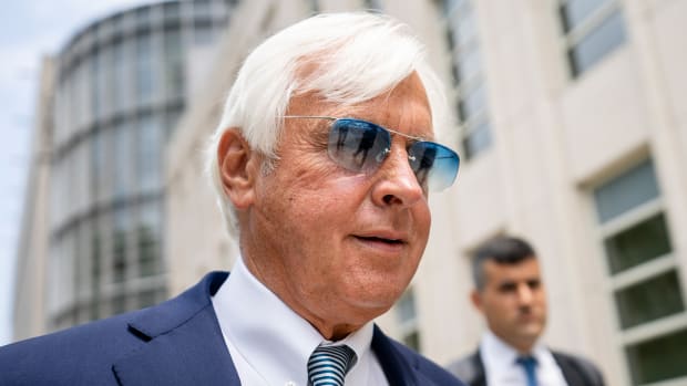 FILE - Horse trainer Bob Baffert leaves federal court, Monday, July 12, 2021, in the Brooklyn borough of New York. The New York Racing Association on Thursday, June 23, 2022 suspended Bob Baffert for one year for repeated medication violations.