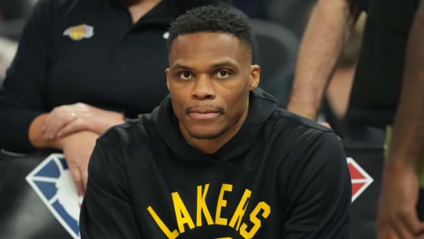 Los Angeles Lakers guard Russell Westbrook (0) sits on the bench,