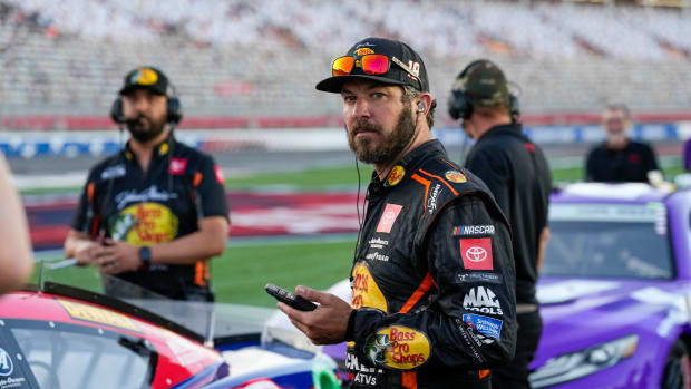 May 28, 2022; Concord, North Carolina, USA; NASCAR Cup Series driver Martin Truex Jr. (19) looks towards the scoring pod during Nascar Cup qualifying at Charlotte Motor Speedway.