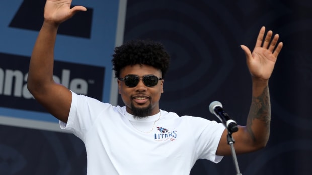 Tennessee Titans number 18 overall pick Treylon Burks steps onto the stage to greet fans during the Titans DraftFest 2022 Saturday, April 30, 2022 at Nissan Stadium.