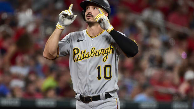 Pittsburgh Pirates CF Bryan Reynolds points to sky