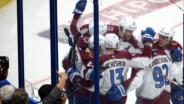 Avalanche center Nathan MacKinnon (29) reacts after scoring a goal against the  Lightning during the second period in Game 6 of the 2022 Stanley Cup Final at Amalie Arena.