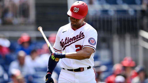 Washington Nationals’ Juan Soto reacts after he struck out during the seventh inning of a baseball game against the Milwaukee Brewers, Sunday, June 12, 2022, in Washington.