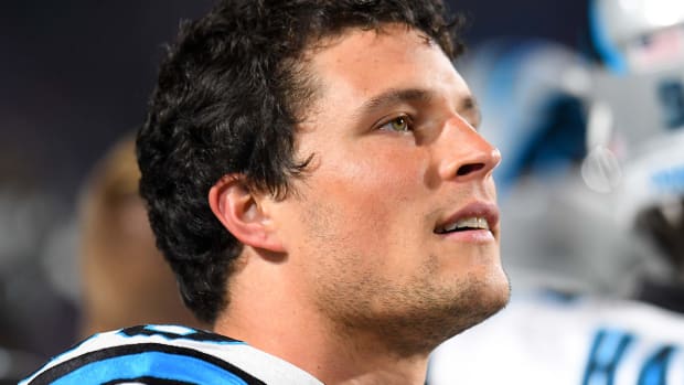 Panthers linebacker Luke Kuechly (59) looks on from the sidelines against the Bills.