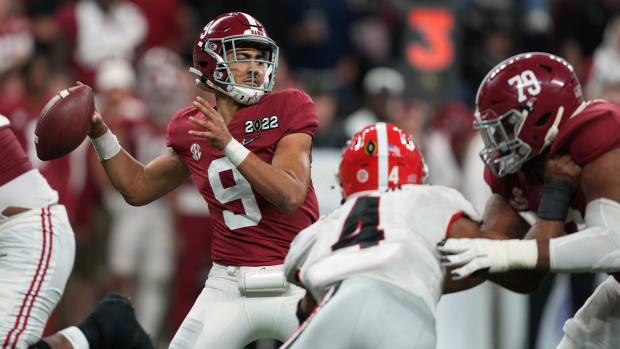 Jan 10, 2022; Indianapolis, IN, USA; Alabama Crimson Tide quarterback Bryce Young (9) drops back to throw against the Georgia Bulldogs during the third quarter of the 2022 CFP college football national championship game at Lucas Oil Stadium.