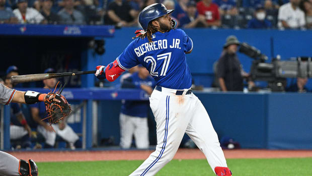 Toronto Blue Jays first baseman Vladimir Guerrero Jr. (27) hits a double against the Baltimore Orioles in the sixth inning at Rogers Centre.