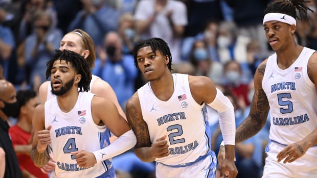 North Carolina Tar Heels guards R.J. Davis (4) and Caleb Love (2) and forward Armando Bacot (5) on the court in the first half at Dean E. Smith Center.