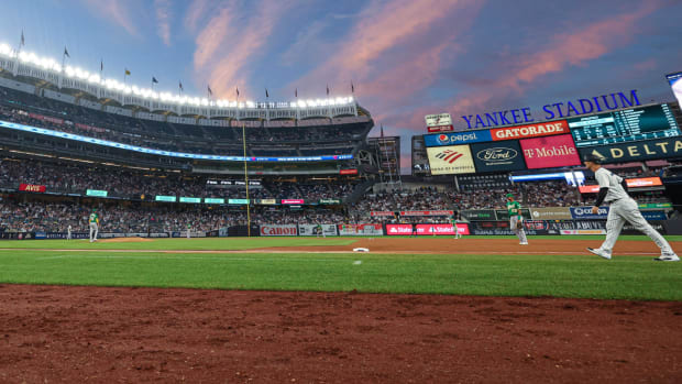 View of Yankees Stadium sunset from dugout.