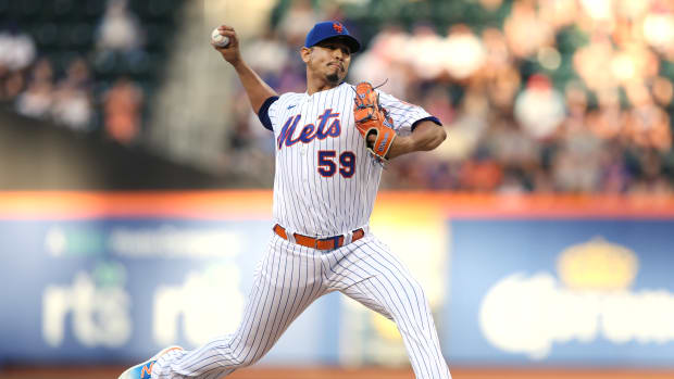 Jun 28, 2022; New York City, New York, USA; New York Mets starting pitcher Carlos Carrasco (59) pitches against the Houston Astros during the first inning at Citi Field.
