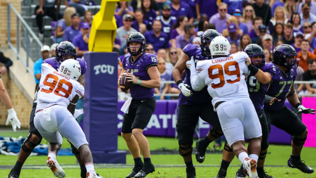 Oct 2, 2021; Fort Worth, Texas, USA; TCU Horned Frogs quarterback Max Duggan (15) throws during the second quarter against the Texas Longhorns at Amon G. Carter Stadium.
