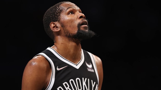 Nets forward Kevin Durant looks up during a game.