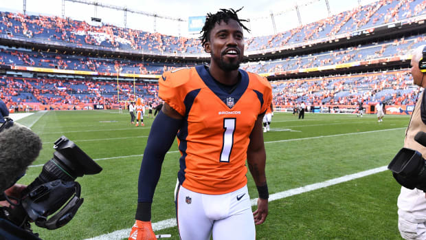 Former Broncos punter Marquette King (1) celebrates a win over the Raiders.