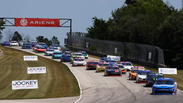Jul 2, 2022; Elkhart Lake, Wisconsin, USA; Xfinity Series driver Kyle Larson (17) leads the field during the Henry 180 at Road America.