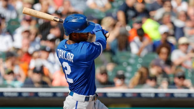Jul 2, 2022; Detroit, Michigan, USA; Kansas City Royals center fielder Michael A. Taylor (2) hits a single in the fourth inning against the Detroit Tigers at Comerica Park. Mandatory Credit: Rick Osentoski-USA TODAY Sports