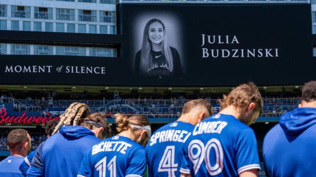 Jul 3, 2022; Toronto, Ontario, CAN; Toronto Blue Jays have a moment of silence for the passing of Toronto Blue Jays first base coach Mark Budzinski (53) daughter Julia Budzinski before playing the Tampa Bay Rays at Rogers Centre. Mandatory Credit: Kevin Sousa-USA TODAY Sports