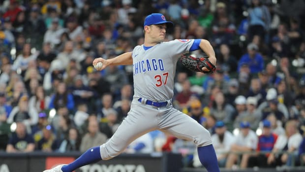Chicago Cubs relief pitcher David Robertson (37) delivers a pitch against the Milwaukee Brewers in the eighth inning at American Family Field on May 1, 2022