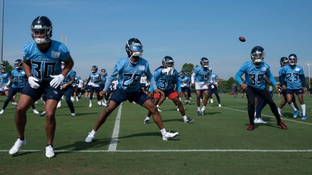 Tennessee Titans warm up during practice at Saint Thomas Sports Park Wednesday, June 1, 2022, in Nashville, Tenn.