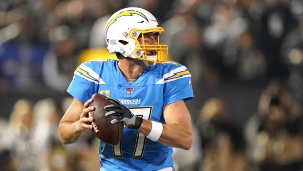 Nov 7, 2019; Oakland, CA, USA; Los Angeles Chargers quarterback Philip Rivers (17) drops back to pass against the Oakland Raiders during the first quarter at Oakland Coliseum. Mandatory Credit: Darren Yamashita-USA TODAY Sports